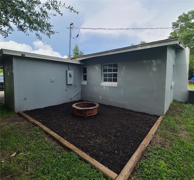 4118 Kirkland Blvd, Orlando, FL 32811 - rear view of property featuring stucco siding