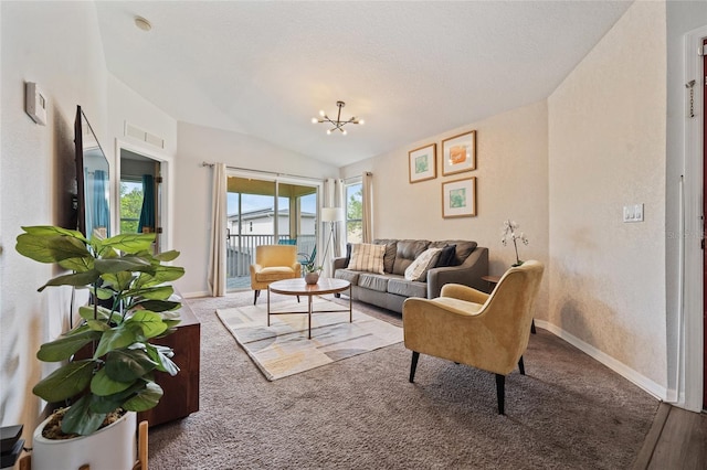 2786 Club Cortile Cir Unit B, Kissimmee, FL 34746 - living room with vaulted ceiling, a chandelier, and carpet floors
