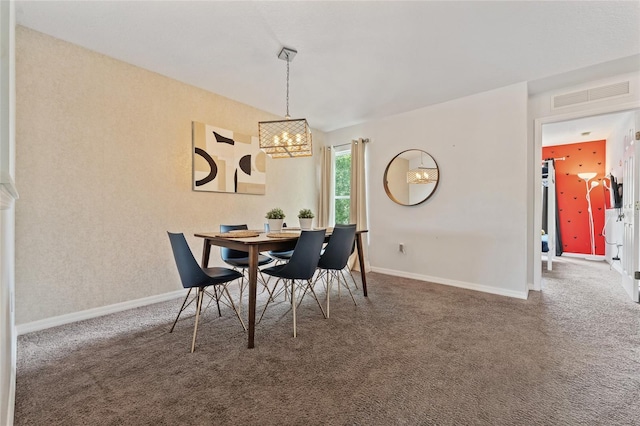 2786 Club Cortile Cir Unit B, Kissimmee, FL 34746 - dining room featuring a chandelier and carpet flooring