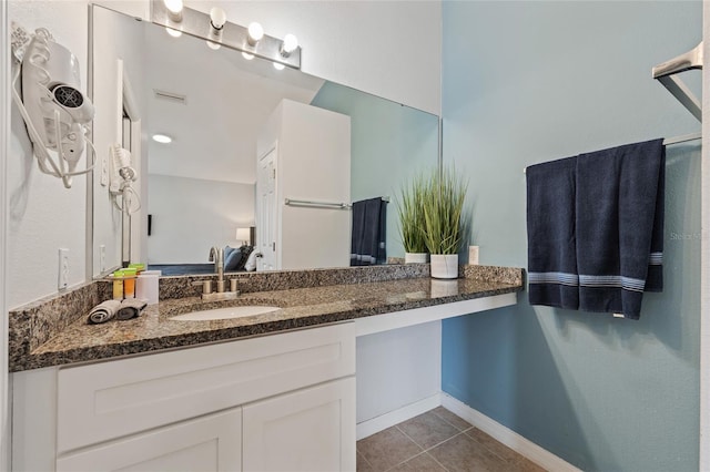 2786 Club Cortile Cir Unit B, Kissimmee, FL 34746 - bathroom with tile patterned flooring and vanity