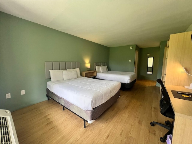 5245 W Irlo Bronson Memorial Hwy Unit 154, Kissimmee, FL 34746 - bedroom featuring wood finished floors