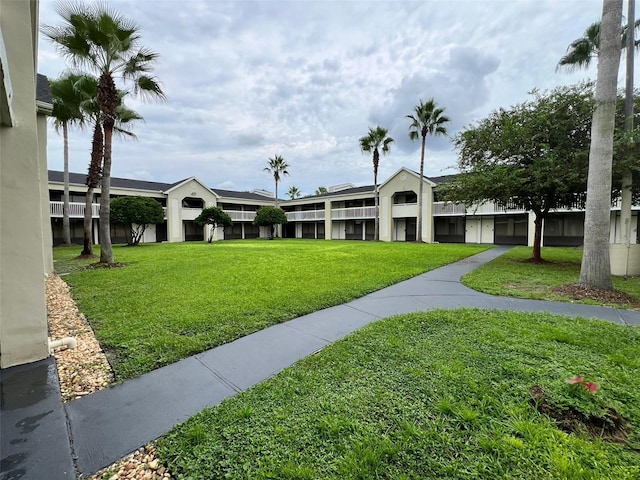 5245 W Irlo Bronson Memorial Hwy Unit 156, Kissimmee, FL 34746 - view of home's community with a yard