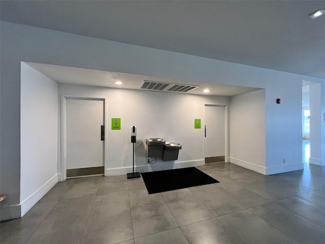 5245 W Irlo Bronson Memorial Hwy Unit 156, Kissimmee, FL 34746 - entryway featuring baseboards and recessed lighting