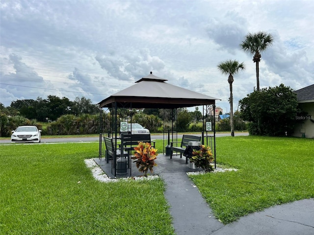 5245 W Irlo Bronson Memorial Hwy Unit 156, Kissimmee, FL 34746 - view of home's community with a gazebo and a lawn