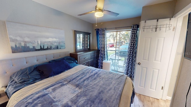 133 Oyster Bay Cir Unit 100, Altamonte Springs, FL 32701 - bedroom with access to exterior, light wood-style flooring, and a ceiling fan