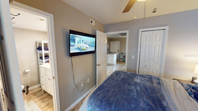 133 Oyster Bay Cir Unit 100, Altamonte Springs, FL 32701 - bedroom with light wood-style floors, a closet, ensuite bath, and ceiling fan