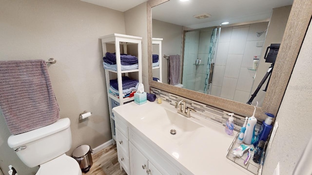 133 Oyster Bay Cir Unit 100, Altamonte Springs, FL 32701 - bathroom featuring vanity, a shower stall, and wood finished floors