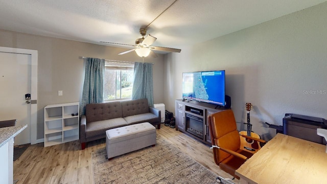 133 Oyster Bay Cir Unit 100, Altamonte Springs, FL 32701 - living area featuring light wood-type flooring and a ceiling fan