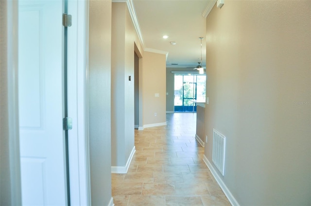 2825 Attwater Loop, Winter Haven, FL 33884 - corridor with crown molding, light stone finish flooring, and recessed lighting