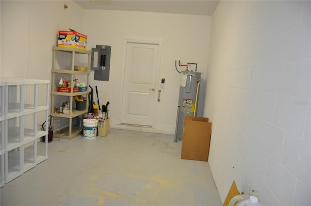 2825 Attwater Loop, Winter Haven, FL 33884 - below grade area featuring electric panel, water heater, and concrete block wall