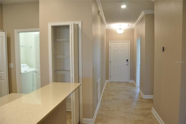 2825 Attwater Loop, Winter Haven, FL 33884 - hall featuring washing machine and dryer and crown molding