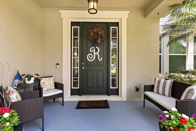 2700 Tree Meadow Loop, Apopka, FL 32712 - doorway to property featuring stucco siding