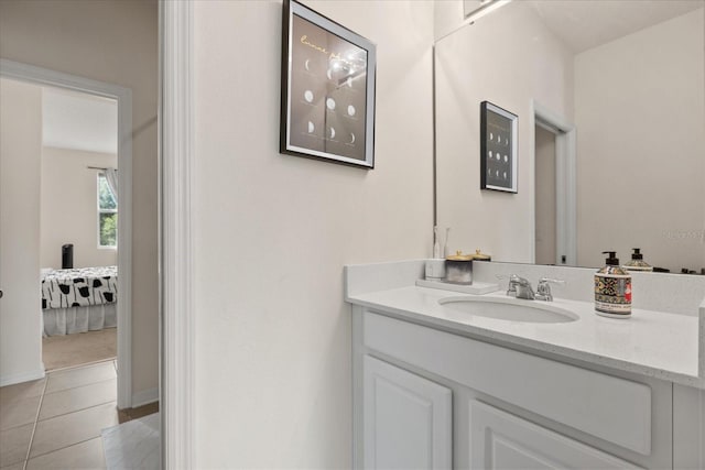2700 Tree Meadow Loop, Apopka, FL 32712 - bathroom with vanity, connected bathroom, and tile patterned floors