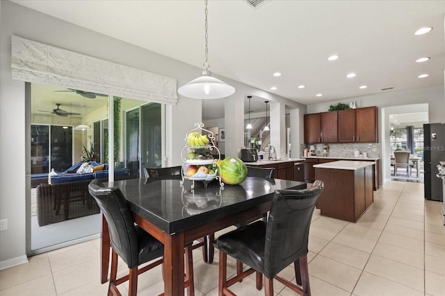 2700 Tree Meadow Loop, Apopka, FL 32712 - dining space with recessed lighting, light tile patterned floors, and a ceiling fan