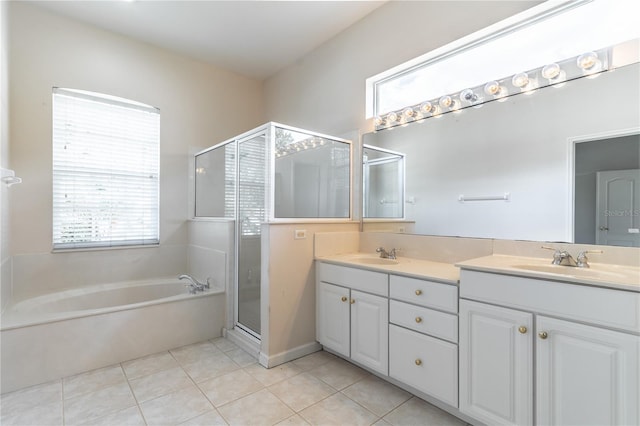 2340 Blackjack Oak St, Ocoee, FL 34761 - full bath with double vanity, a garden tub, tile patterned flooring, and a stall shower