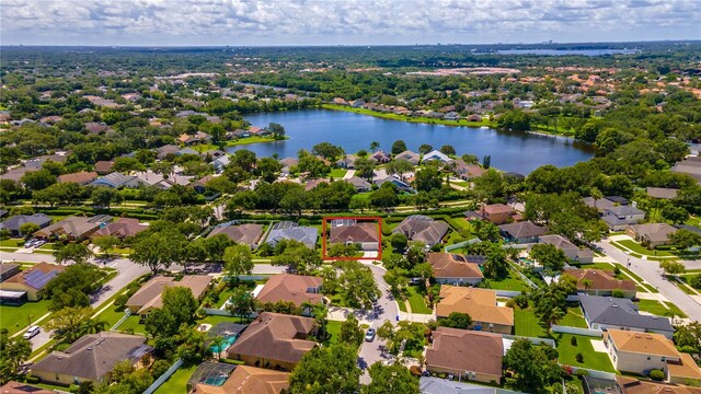 2340 Blackjack Oak St, Ocoee, FL 34761 - aerial perspective of suburban area featuring a large body of water and property parcel outlined