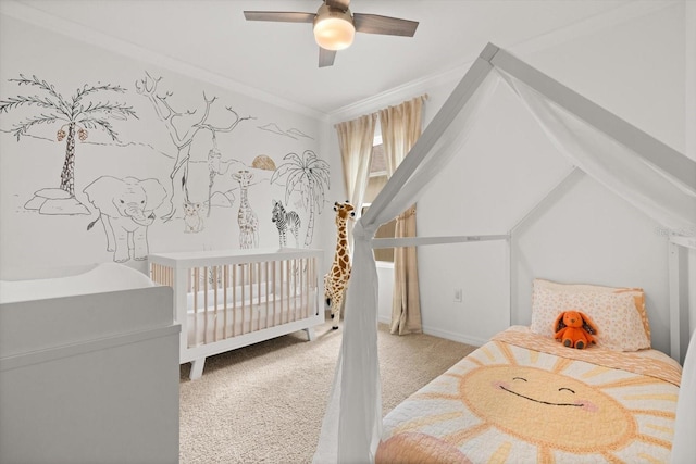 5684 Horseshoe Loop, Apopka, FL 32712 - bedroom with carpet floors, a crib, ornamental molding, and a ceiling fan