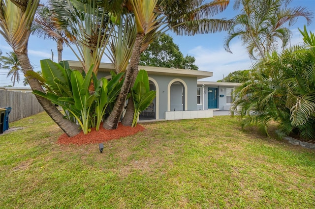view of front of house featuring stucco siding
