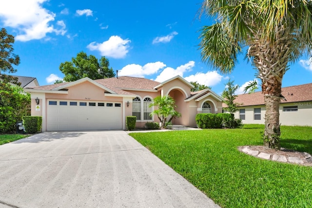 3422 Swallow Hill St, Clermont, FL 34714 - ranch-style home featuring stucco siding, an attached garage, a front yard, and concrete driveway