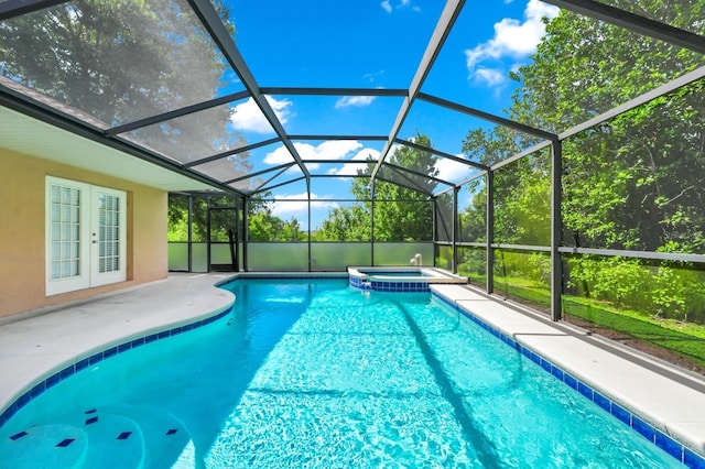 3422 Swallow Hill St, Clermont, FL 34714 - view of swimming pool with french doors, a pool with connected hot tub, a patio, and a lanai