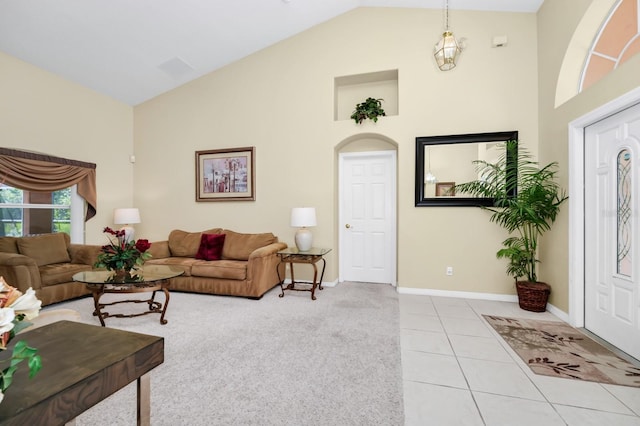 3422 Swallow Hill St, Clermont, FL 34714 - tiled living area with high vaulted ceiling and baseboards