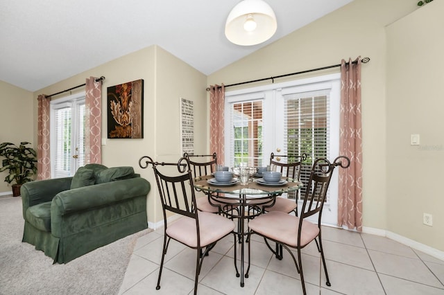 3422 Swallow Hill St, Clermont, FL 34714 - dining area with french doors, vaulted ceiling, and light tile patterned floors