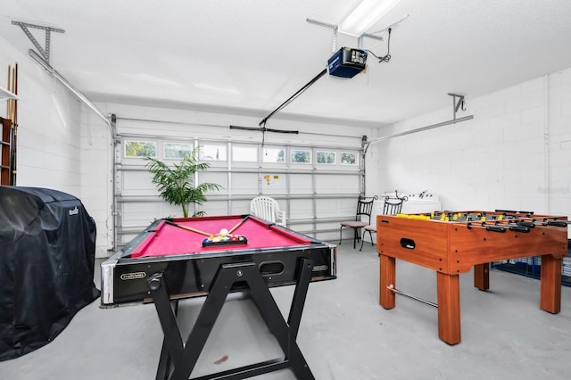 3422 Swallow Hill St, Clermont, FL 34714 - game room featuring a garage, concrete flooring, billiards table, and concrete block wall