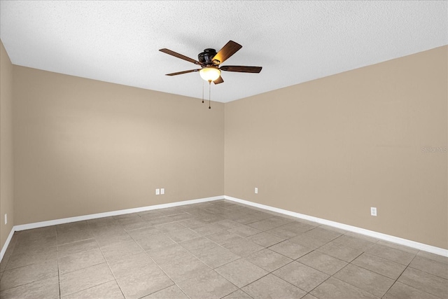 15175 Sugargrove Way, Orlando, FL 32828 - unfurnished room featuring a ceiling fan, light tile patterned floors, and a textured ceiling