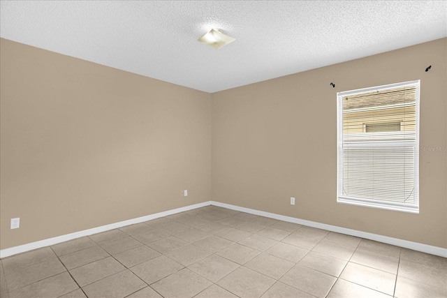 15175 Sugargrove Way, Orlando, FL 32828 - empty room with light tile patterned floors and a textured ceiling
