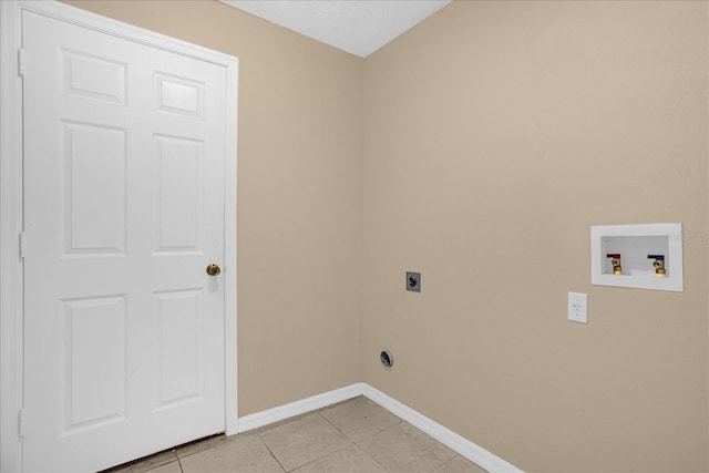 15175 Sugargrove Way, Orlando, FL 32828 - washroom featuring electric dryer hookup, washer hookup, and light tile patterned floors