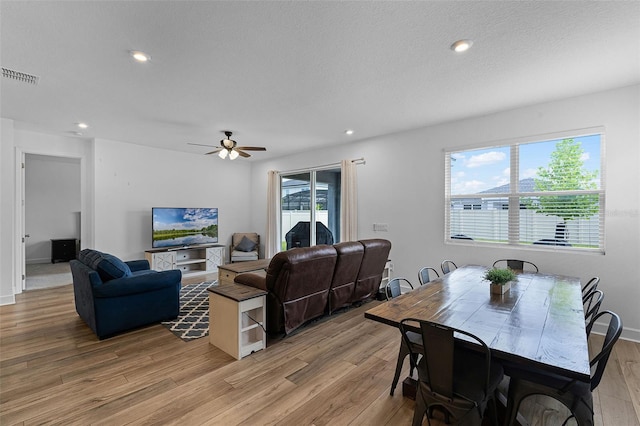 2936 Wild Mulberry Dr, Clermont, FL 34711 - dining room with light wood finished floors, recessed lighting, and a ceiling fan