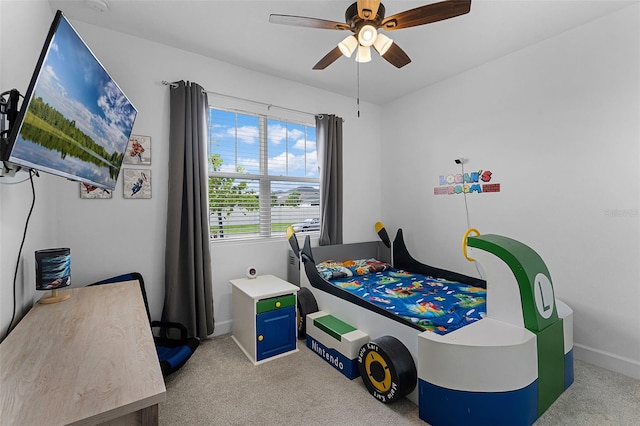 2936 Wild Mulberry Dr, Clermont, FL 34711 - bedroom with light colored carpet and ceiling fan