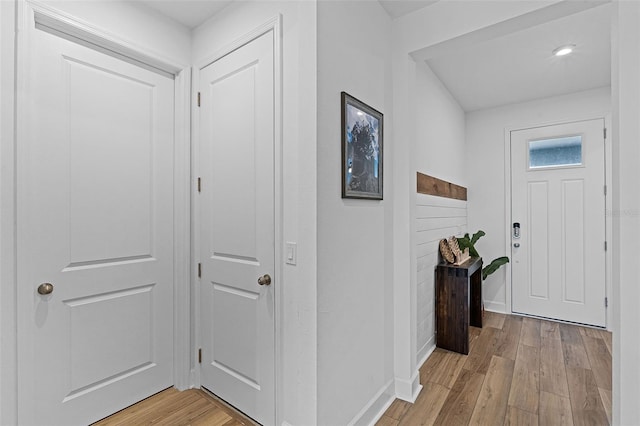 2936 Wild Mulberry Dr, Clermont, FL 34711 - foyer entrance featuring light wood-style flooring