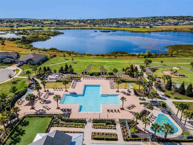2936 Wild Mulberry Dr, Clermont, FL 34711 - drone / aerial view of a pool area and a nearby body of water