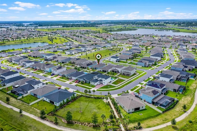 2936 Wild Mulberry Dr, Clermont, FL 34711 - aerial view of residential area with a nearby body of water