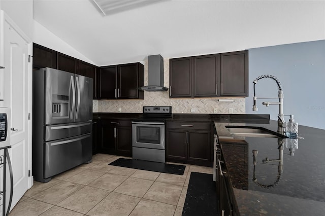 305 Chelmsford Ct, Kissimmee, FL 34758 - kitchen featuring appliances with stainless steel finishes, wall chimney exhaust hood, lofted ceiling, decorative backsplash, and light tile patterned floors