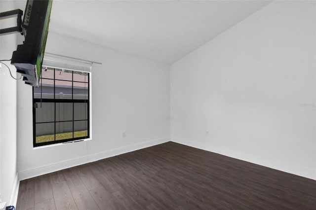 305 Chelmsford Ct, Kissimmee, FL 34758 - unfurnished room featuring wood finished floors and baseboards