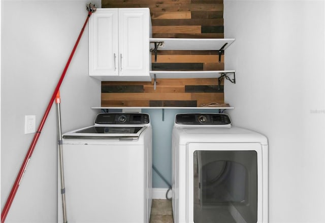 305 Chelmsford Ct, Kissimmee, FL 34758 - washroom featuring washer and clothes dryer and cabinet space