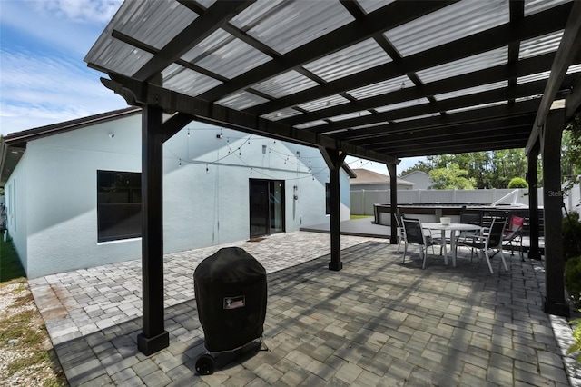 305 Chelmsford Ct, Kissimmee, FL 34758 - view of patio / terrace featuring outdoor dining space and a pergola