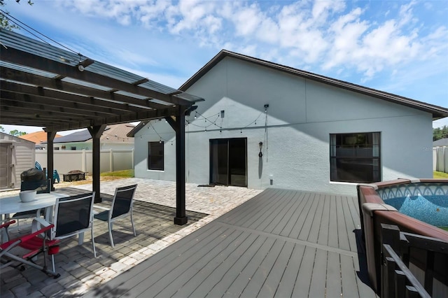 305 Chelmsford Ct, Kissimmee, FL 34758 - wooden terrace featuring a pergola, a shed, a patio, and outdoor dining space
