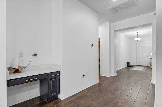 17242 Hickory Wind Dr, Clermont, FL 34711 - interior space with dark wood finished floors and baseboards