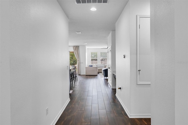 17242 Hickory Wind Dr, Clermont, FL 34711 - hallway with dark wood finished floors and recessed lighting