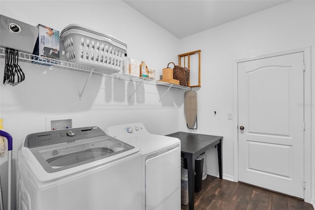 17242 Hickory Wind Dr, Clermont, FL 34711 - laundry room featuring washer and clothes dryer and dark wood finished floors