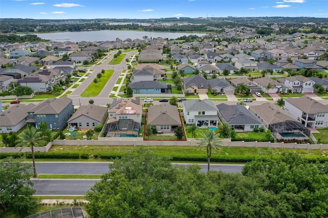 17242 Hickory Wind Dr, Clermont, FL 34711 - aerial perspective of suburban area with a nearby body of water