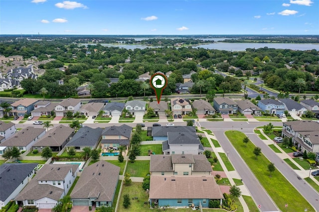 17242 Hickory Wind Dr, Clermont, FL 34711 - aerial perspective of suburban area featuring a nearby body of water