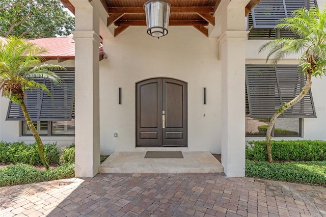 10545 Down Lakeview Cir, Windermere, FL 34786 - doorway to property with stucco siding