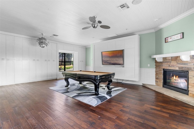 10545 Down Lakeview Cir, Windermere, FL 34786 - recreation room with ceiling fan, ornamental molding, billiards, wood finished floors, and a stone fireplace