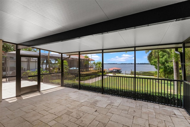 10545 Down Lakeview Cir, Windermere, FL 34786 - unfurnished sunroom featuring a water view