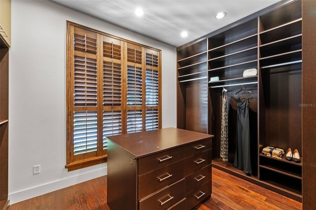 10545 Down Lakeview Cir, Windermere, FL 34786 - walk in closet featuring dark wood finished floors