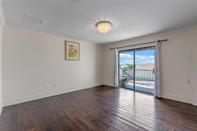 10545 Down Lakeview Cir, Windermere, FL 34786 - empty room with dark wood finished floors and crown molding